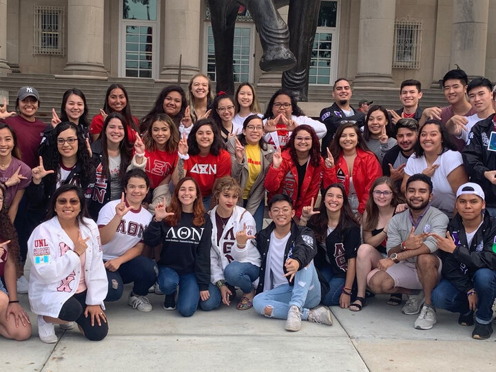 A group shot of posing students